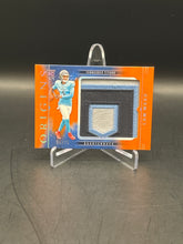 Load image into Gallery viewer, Cam Ward 2025 Panini Origins Rookie Jersey Relic Orange /75 #RJY-CWD
