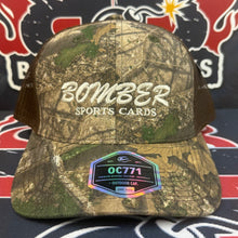 Load image into Gallery viewer, RealTree APX Brown Camo Premium Bomber Sports Cards Hat
